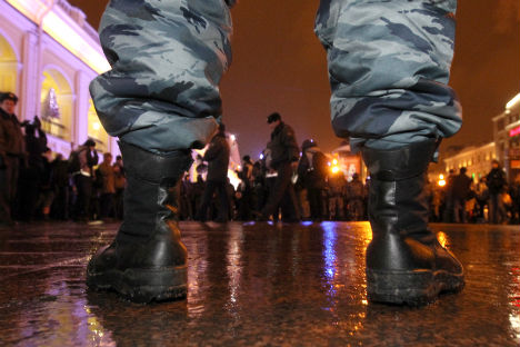 Oppositionelle demonstrieren am 31. Dezember in St. Petersburg und werden permanent überwacht. Foto: Reuters/Vostock-Photo